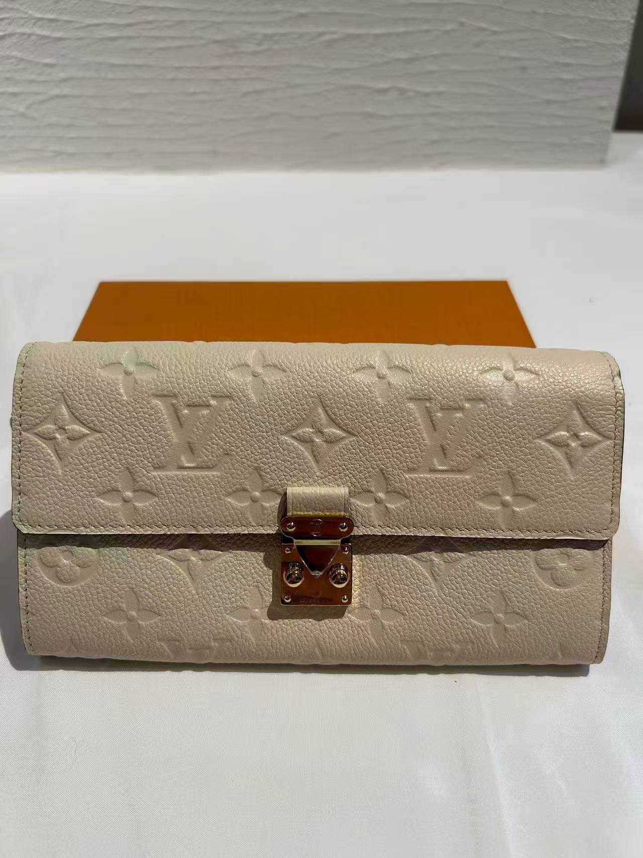 Second-hand Louis Vuitton Zippy Wallet “By the Pool” Monogram Tiles